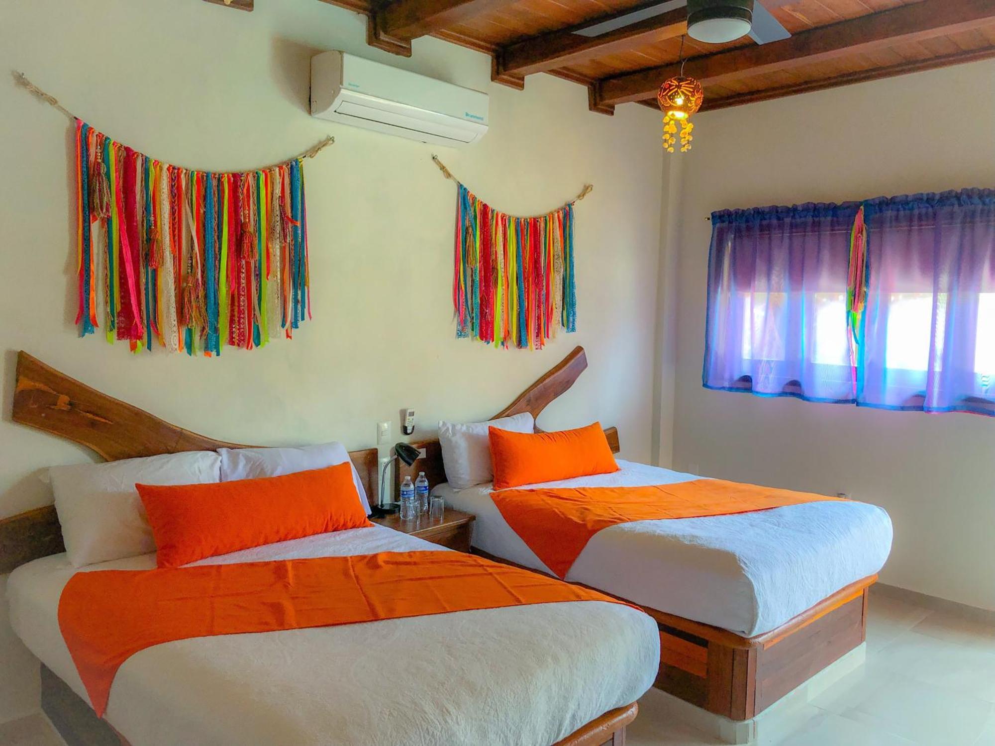 Hotel Hacienda Dos Ojos à Tulum Extérieur photo