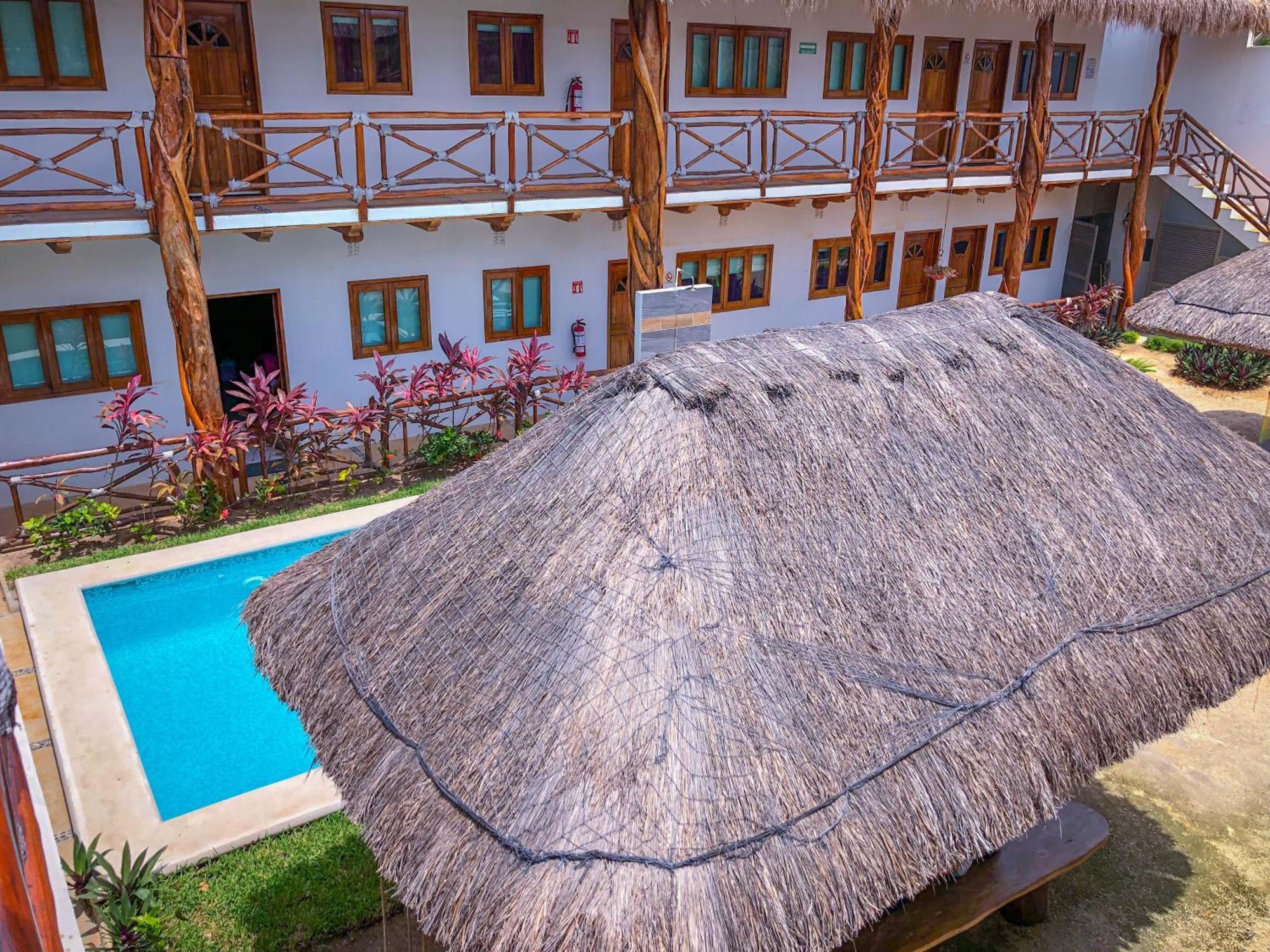 Hotel Hacienda Dos Ojos à Tulum Extérieur photo