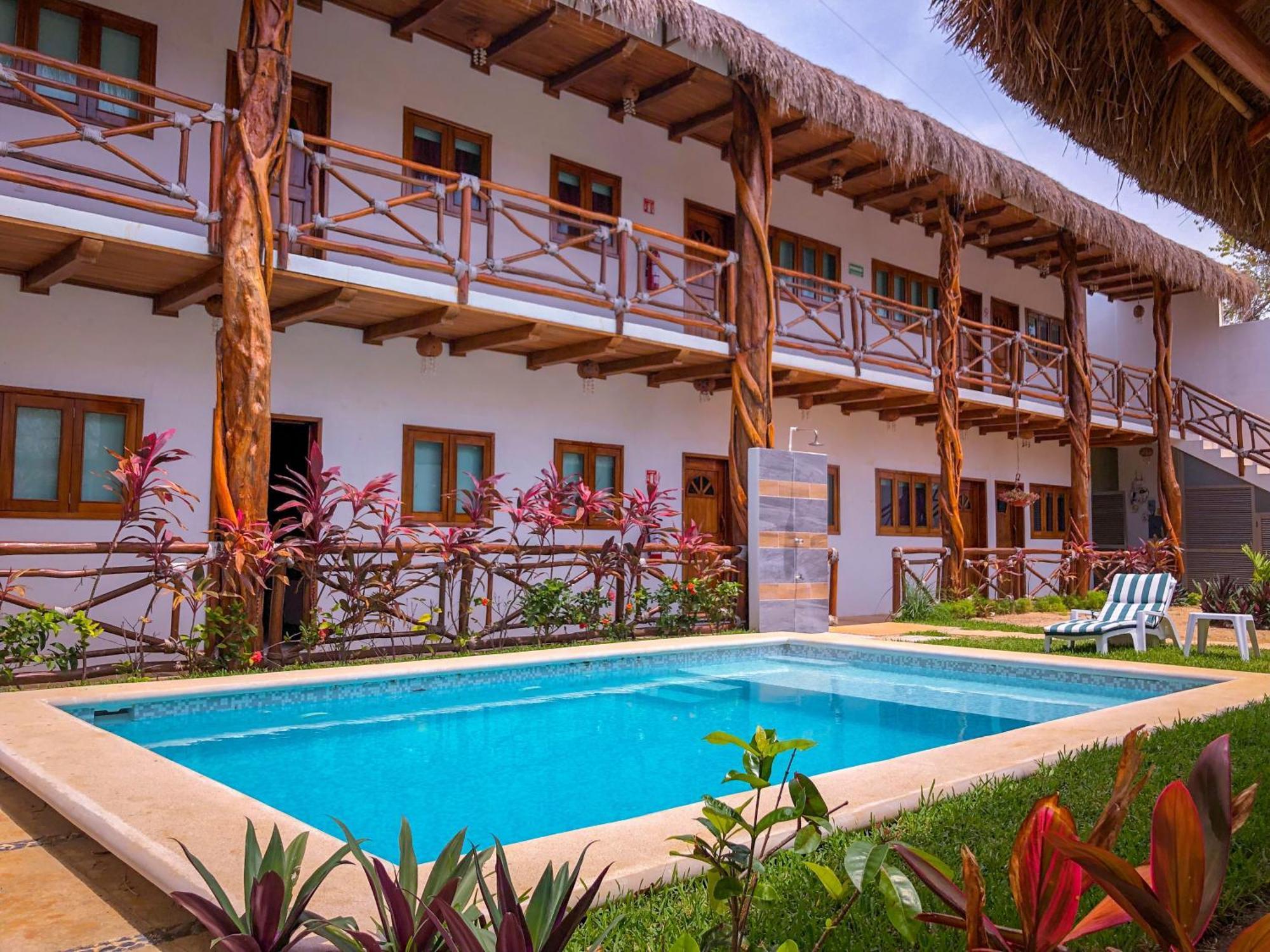 Hotel Hacienda Dos Ojos à Tulum Extérieur photo