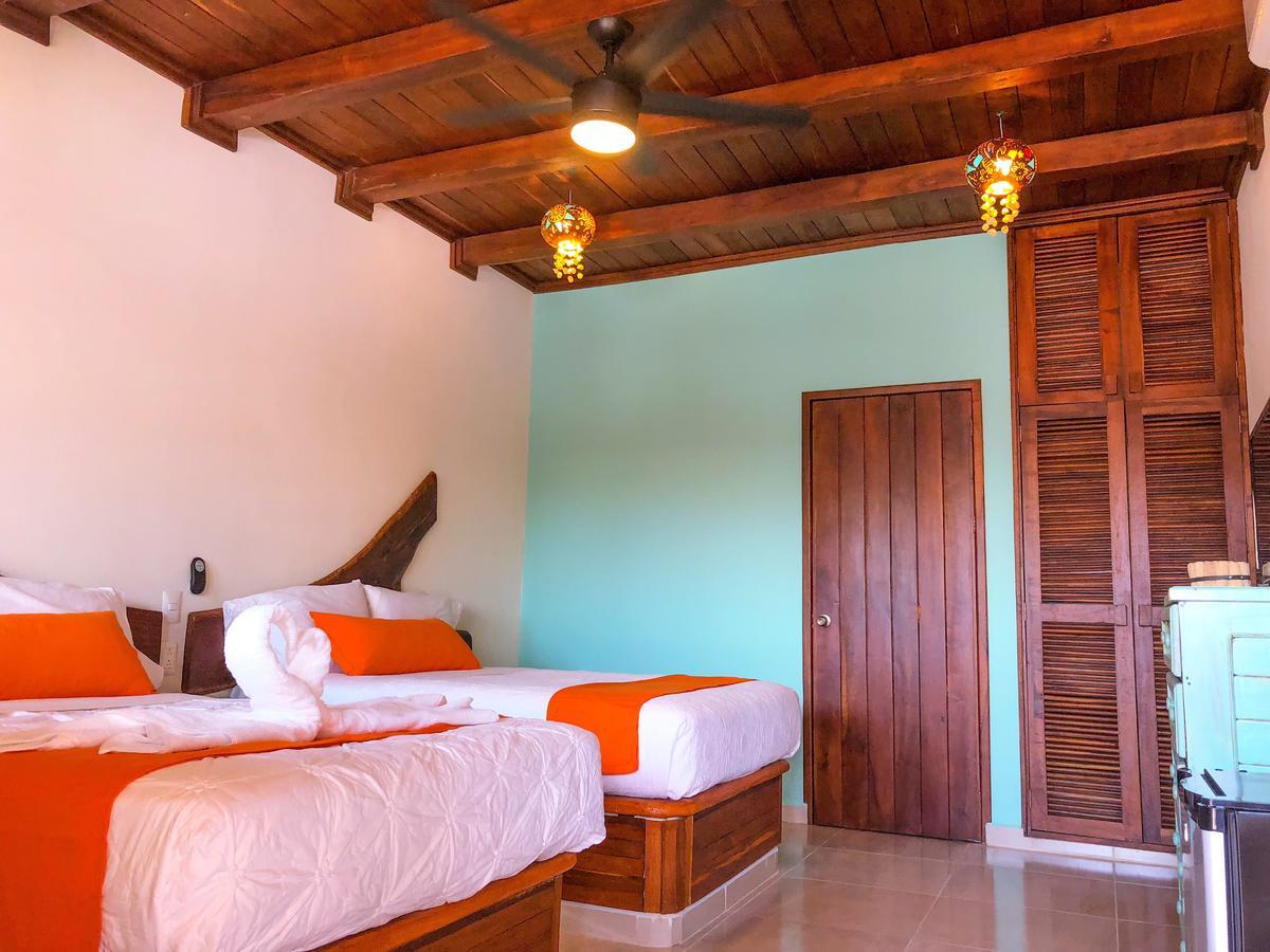 Hotel Hacienda Dos Ojos à Tulum Extérieur photo